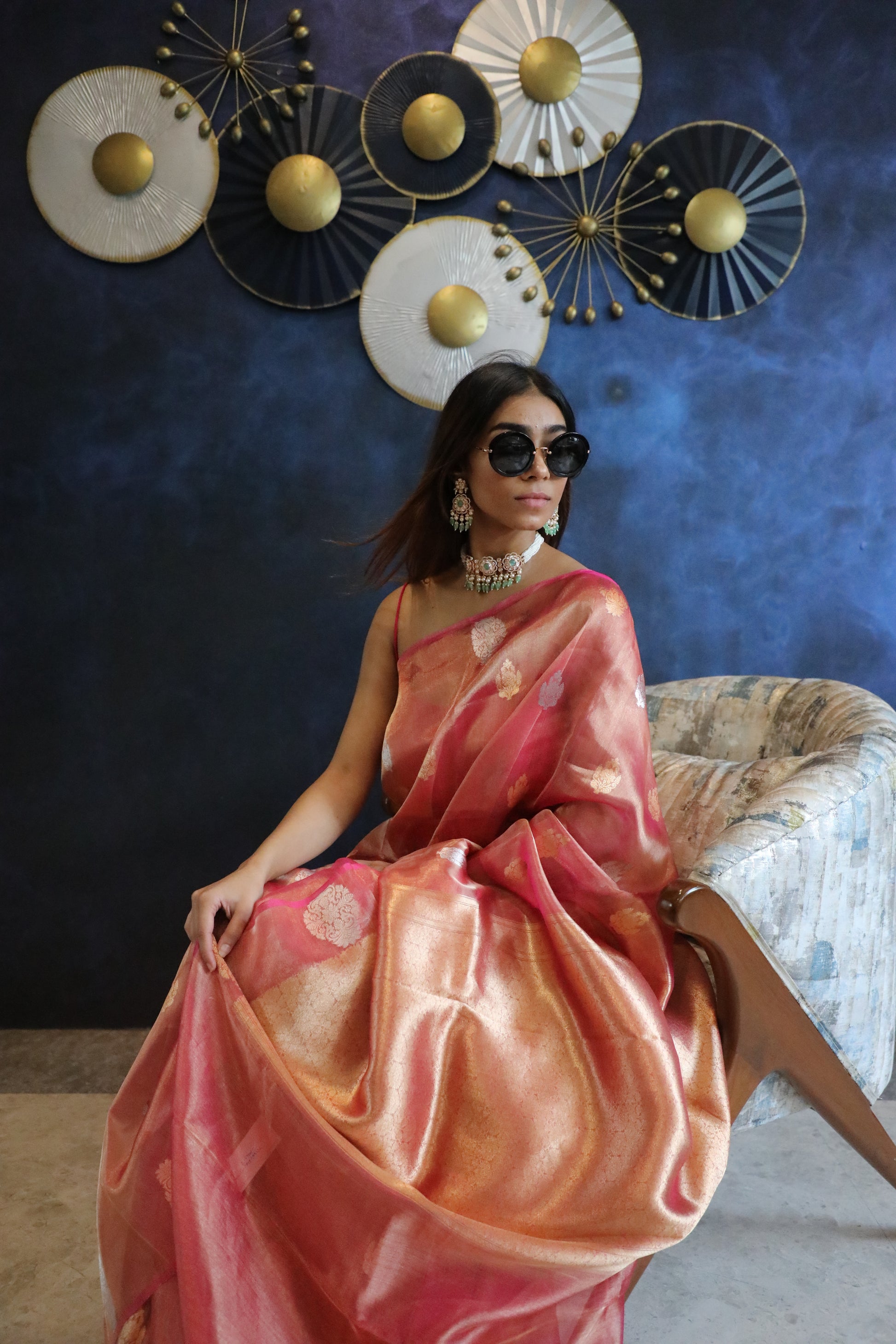 Banarasi pure tissue silk saree in radiant pink, handwoven with floral motifs, horizontal view