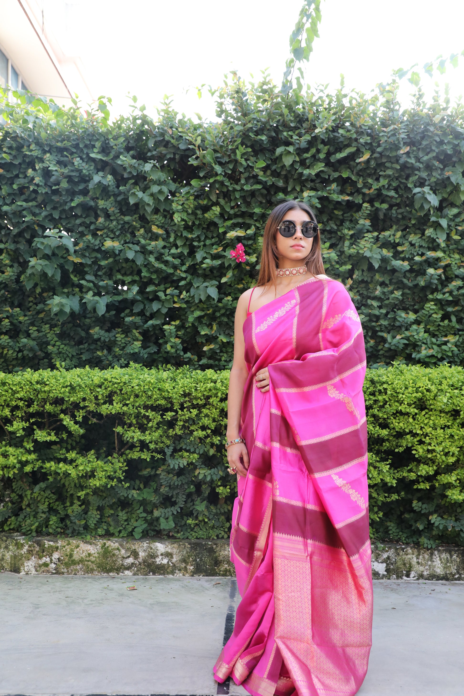 Juhi Banarasi Silk Saree in Pink Hues, Handwoven Banarasi Saree with Rangkat Technique, Elegant Pink Silk Saree with Gold Zari Work, Floral Motif Banarasi Saree for Weddings, Pure Silk Saree with Regal Gold Pallu, Traditional Banarasi Saree from Rang-e-Riwaayat Collection, Luxury Bridal Trousseau Banarasi Saree in Pink, Cultural Festive Wear Saree with Handloom Artistry, Designer Banarasi Saree with Pastel and Bold Pink Stripes, Contemporary Saree with Kadhwa Weave in Pure Silk
Juhi Saree, Banarasi Silk, Ra