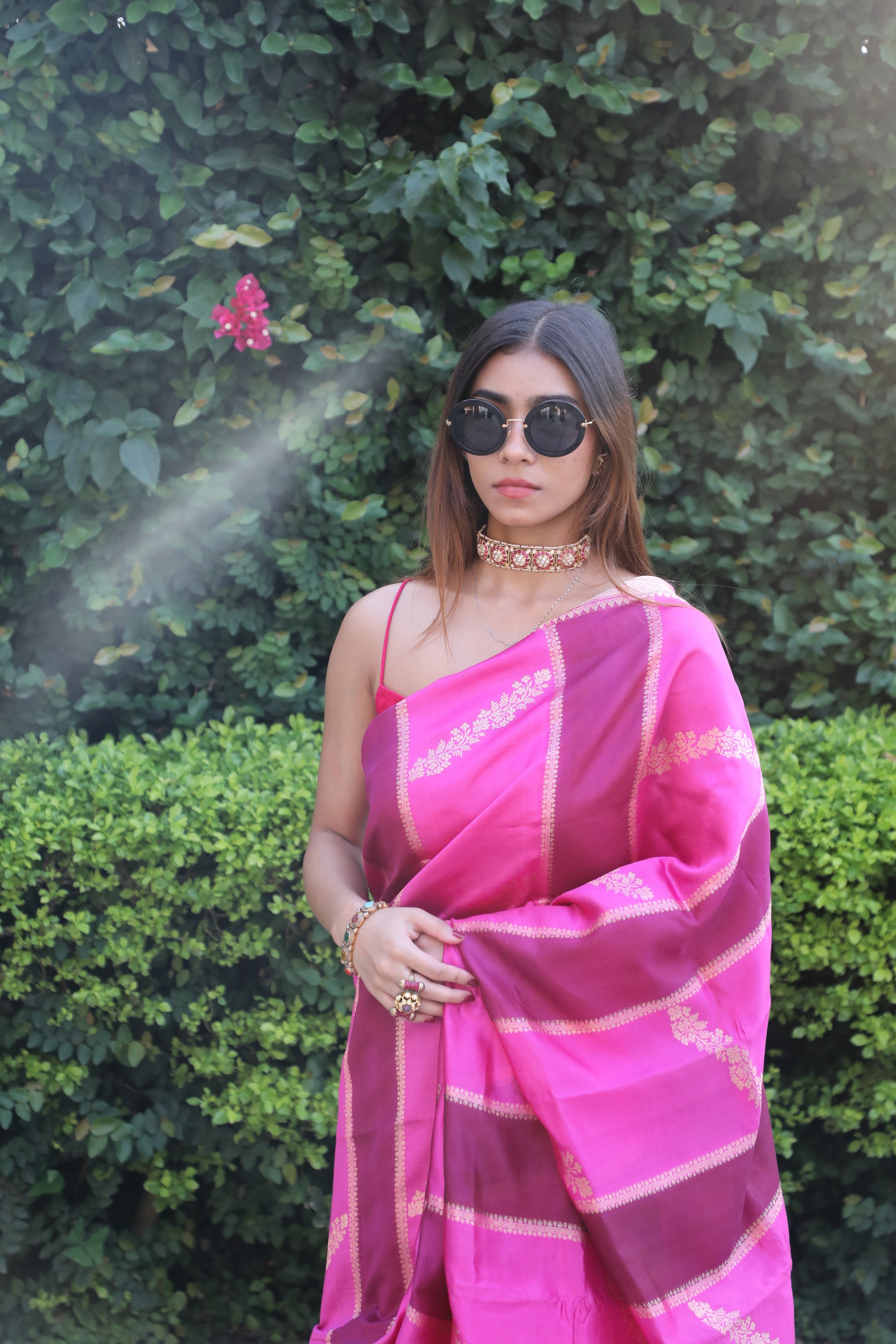 Juhi Banarasi Silk Saree in Pink Hues, Handwoven Banarasi Saree with Rangkat Technique, Elegant Pink Silk Saree with Gold Zari Work, Floral Motif Banarasi Saree for Weddings, Pure Silk Saree with Regal Gold Pallu, Traditional Banarasi Saree from Rang-e-Riwaayat Collection, Luxury Bridal Trousseau Banarasi Saree in Pink, Cultural Festive Wear Saree with Handloom Artistry, Designer Banarasi Saree with Pastel and Bold Pink Stripes, Contemporary Saree with Kadhwa Weave in Pure Silk
Juhi Saree, Banarasi Silk, Ra