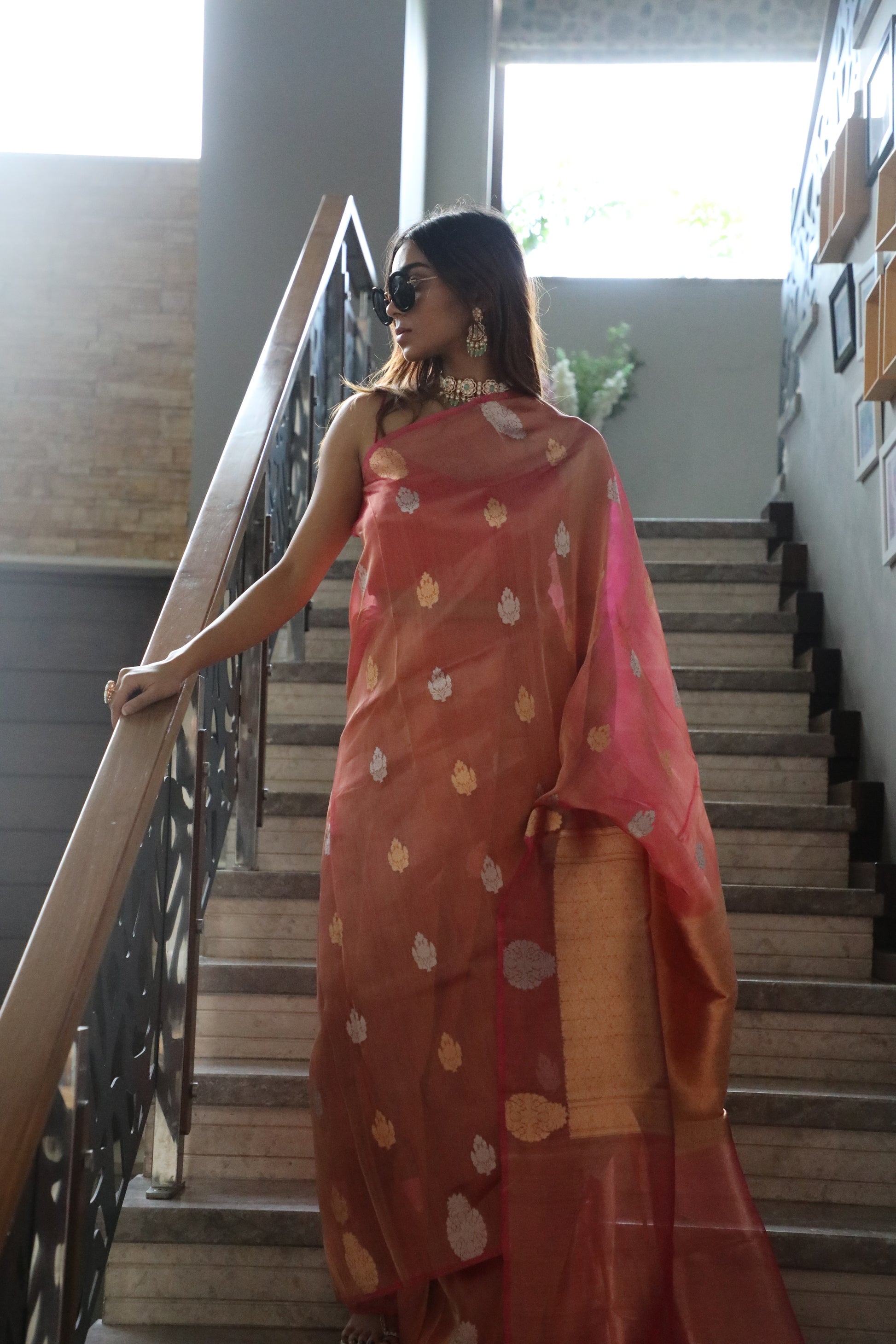 Elegant magenta pink Banarasi saree with shimmering tissue silk base, flat product shot