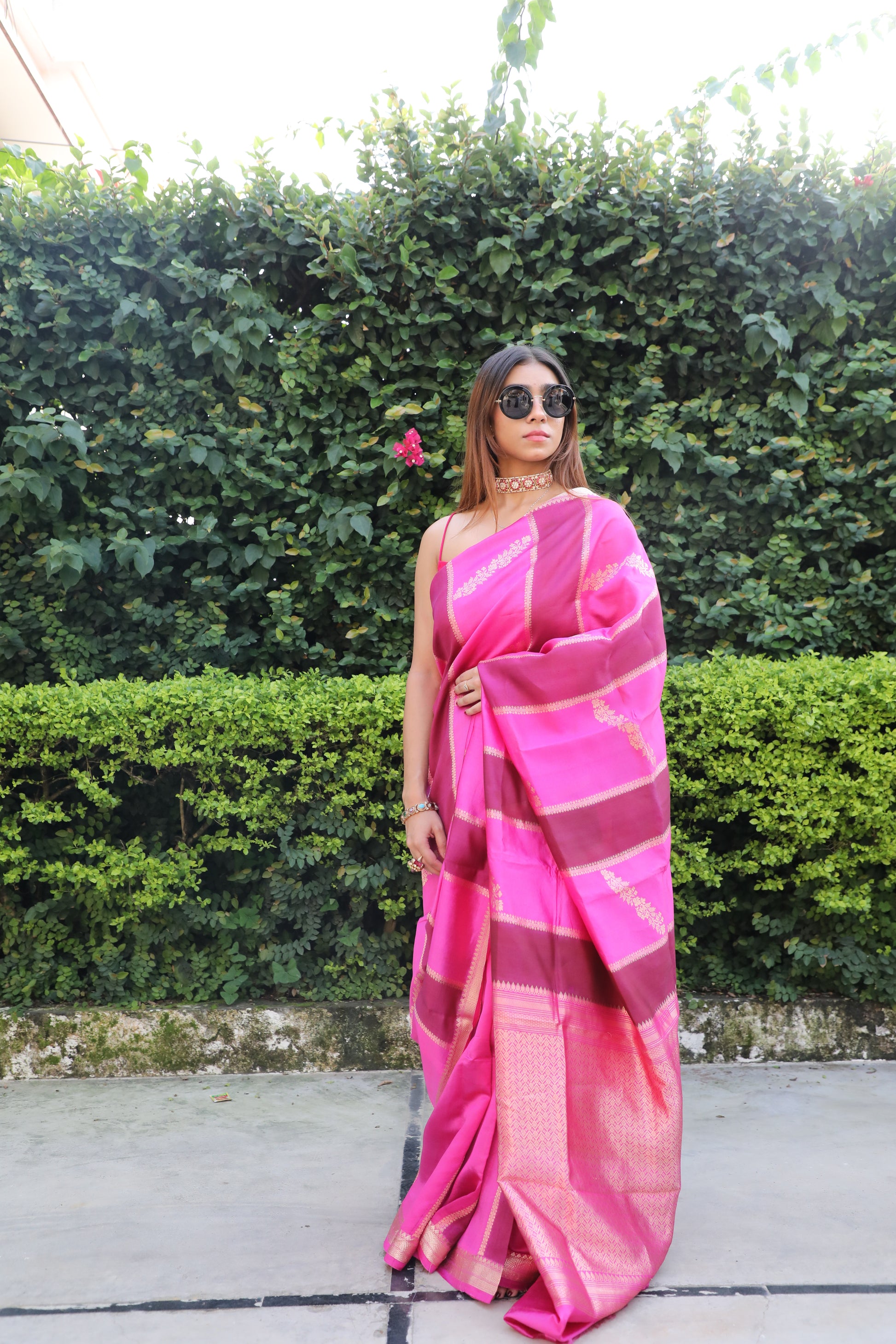 Juhi Banarasi Silk Saree in Pink Hues, Handwoven Banarasi Saree with Rangkat Technique, Elegant Pink Silk Saree with Gold Zari Work, Floral Motif Banarasi Saree for Weddings, Pure Silk Saree with Regal Gold Pallu, Traditional Banarasi Saree from Rang-e-Riwaayat Collection, Luxury Bridal Trousseau Banarasi Saree in Pink, Cultural Festive Wear Saree with Handloom Artistry, Designer Banarasi Saree with Pastel and Bold Pink Stripes, Contemporary Saree with Kadhwa Weave in Pure Silk
Juhi Saree, Banarasi Silk, Ra