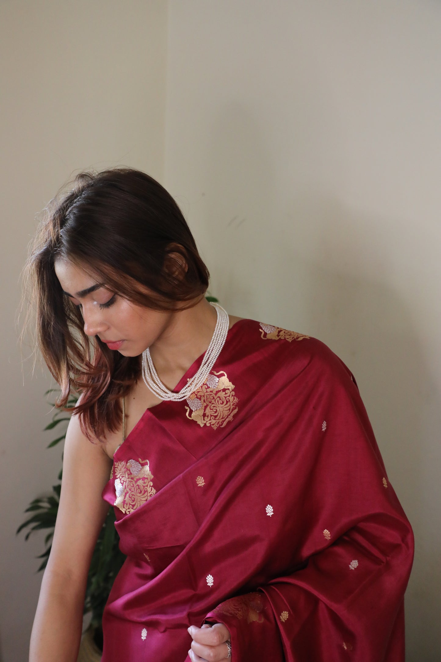 Simhika Banarasi Saree in pomegranate red, pure Katan silk with lion motifs, handwoven in Kadhwa weave — luxury festive wear in India