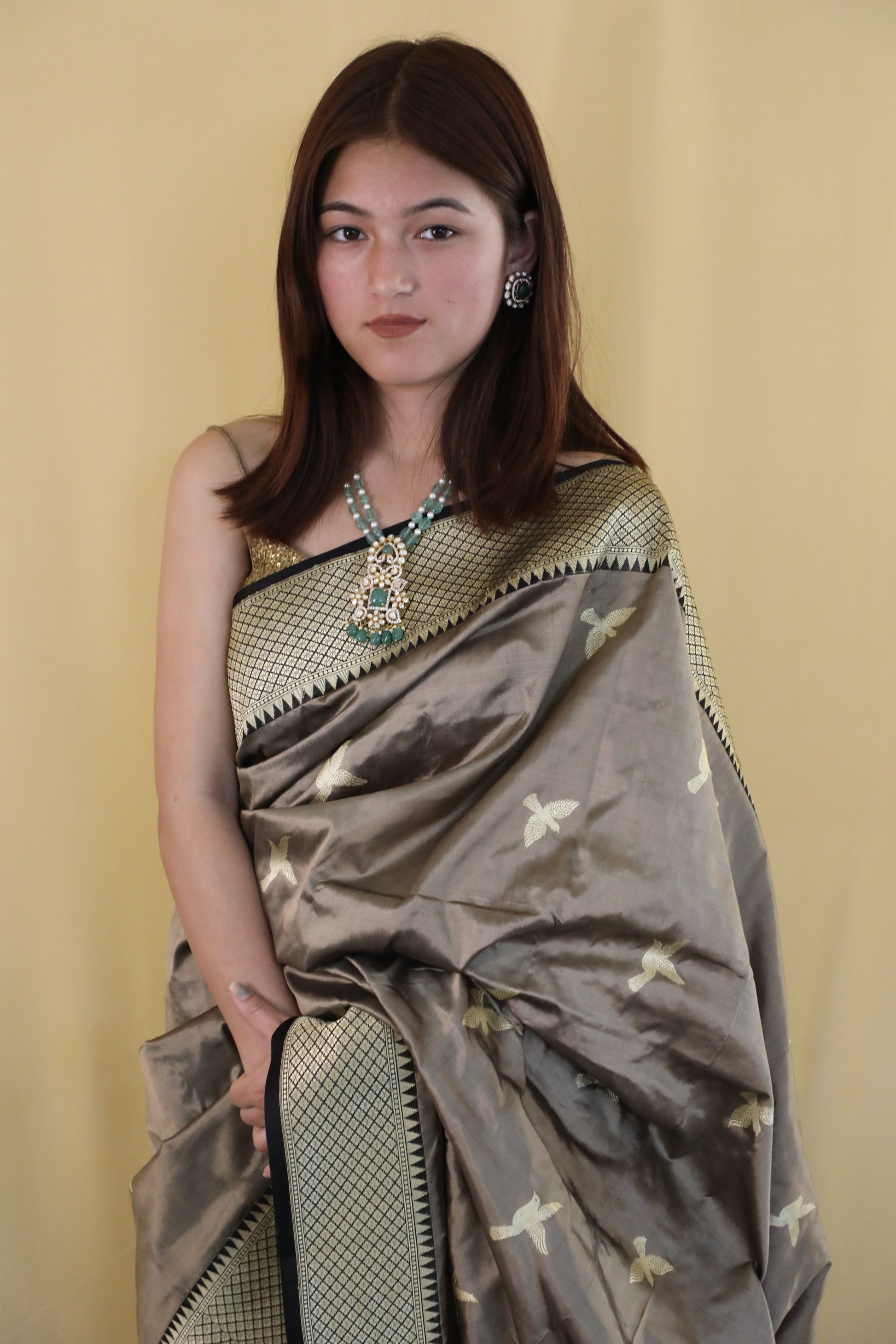 Taupe Suvarna Banarasi Katan silk saree with flying bird motifs
